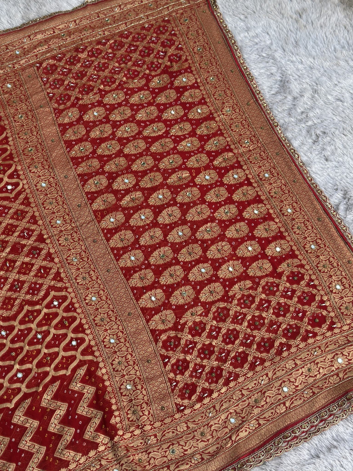 Woven floral brocade border with zari on Bandhej red Banarasi dupatta