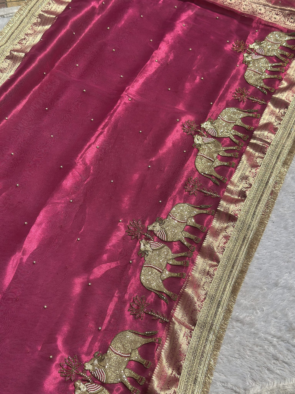 Deep pink silk body with gold zari elephant motifs, Gajanandi saree