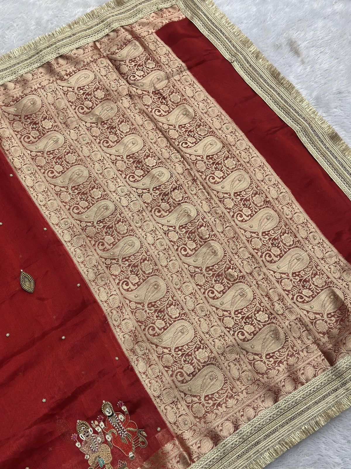 Ganesh Laxmi red Banarasi tissue saree with paisley brocade pallu