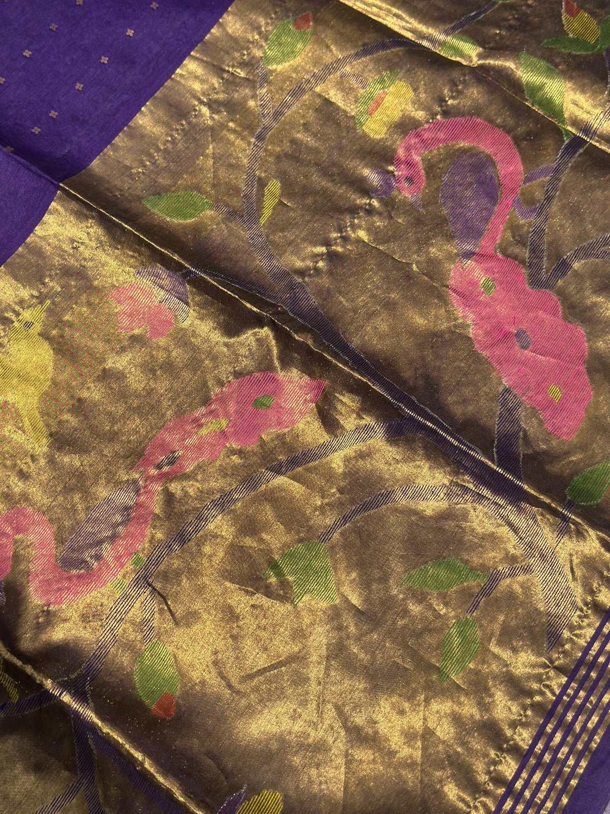 Woven peacock motif detail on deep purple Jamdani pallu