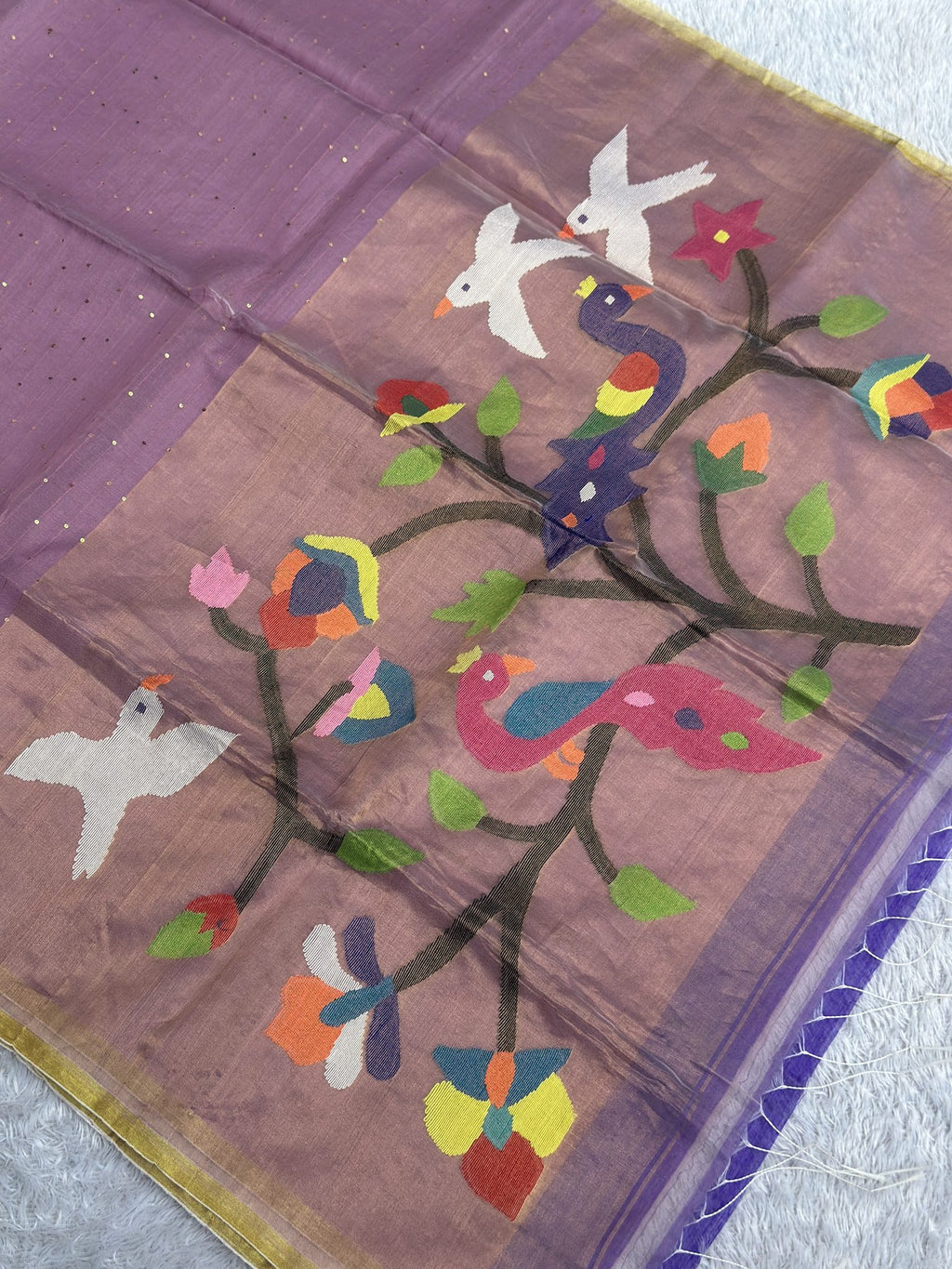Lavender rose Jamdani saree with woven peacock and bird motifs