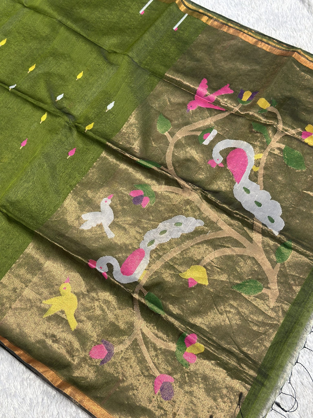 Olive green Jamdani saree with gold zari pallu and peacock motifs