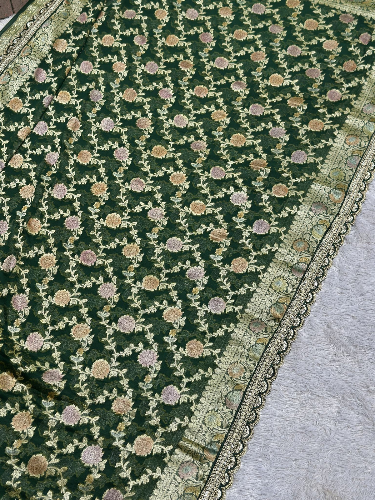 Green khaddi georgette saree drape with gold zari border