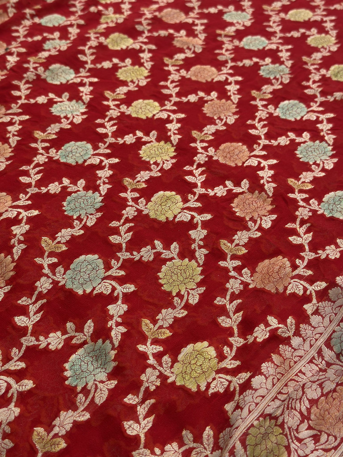 Red Khaddi Georgette saree with included blouse fabric