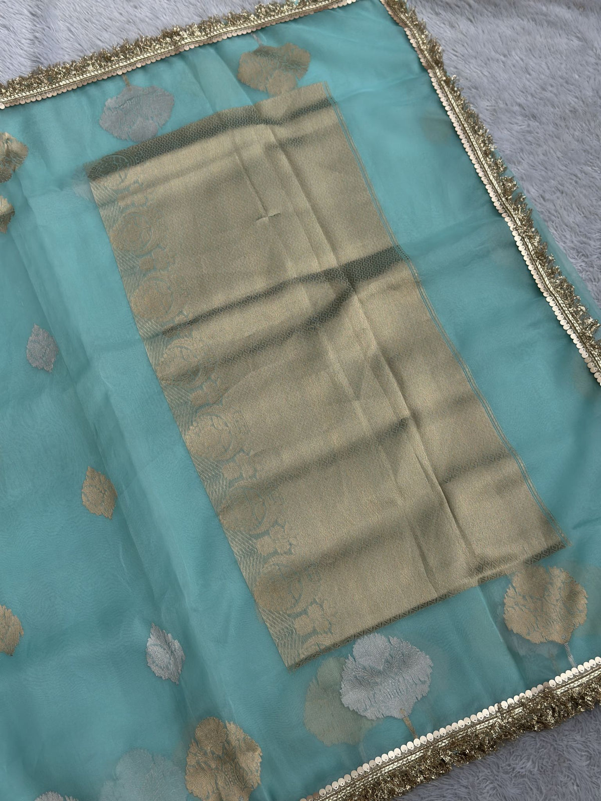Pure Kora sky blue silk saree with soft flowing drape