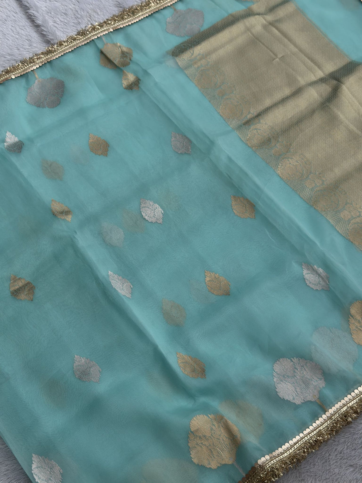 Sky blue pure kora silk saree with gold border