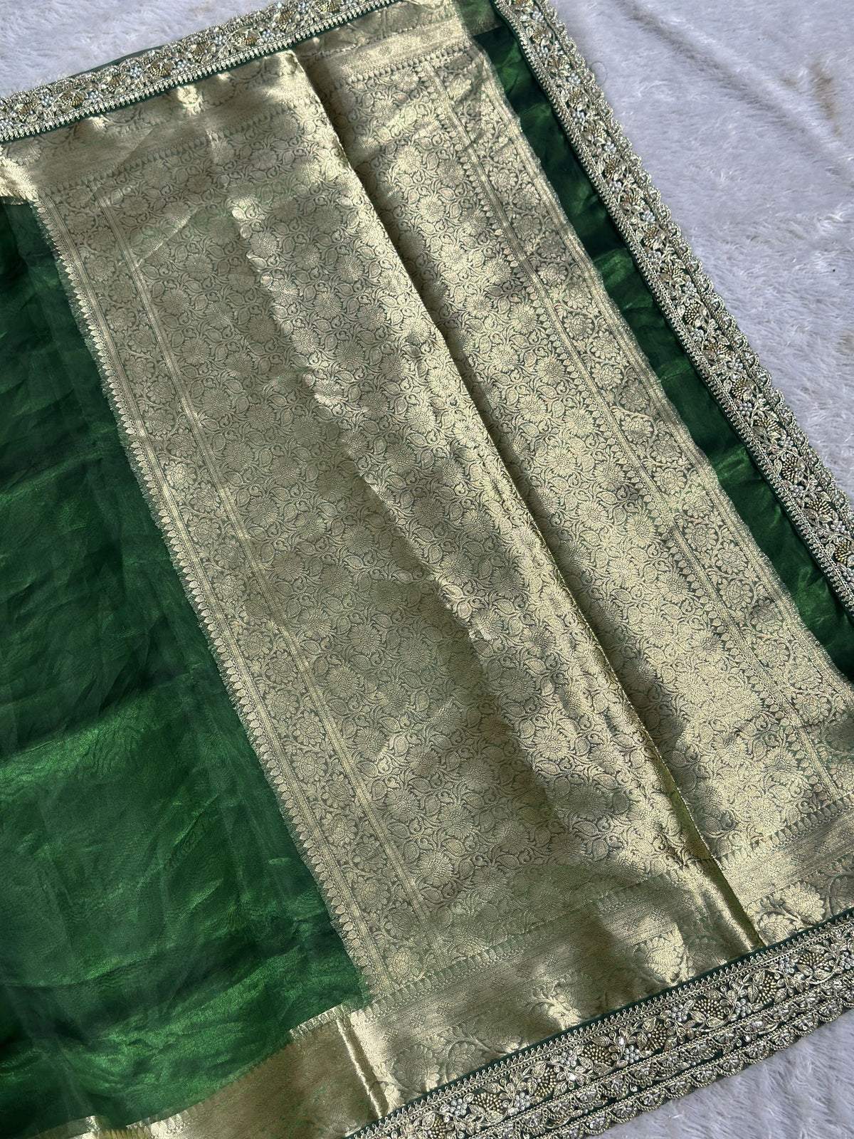 Saundarya green Banarasi tissue saree with broad gold zari brocade pallu