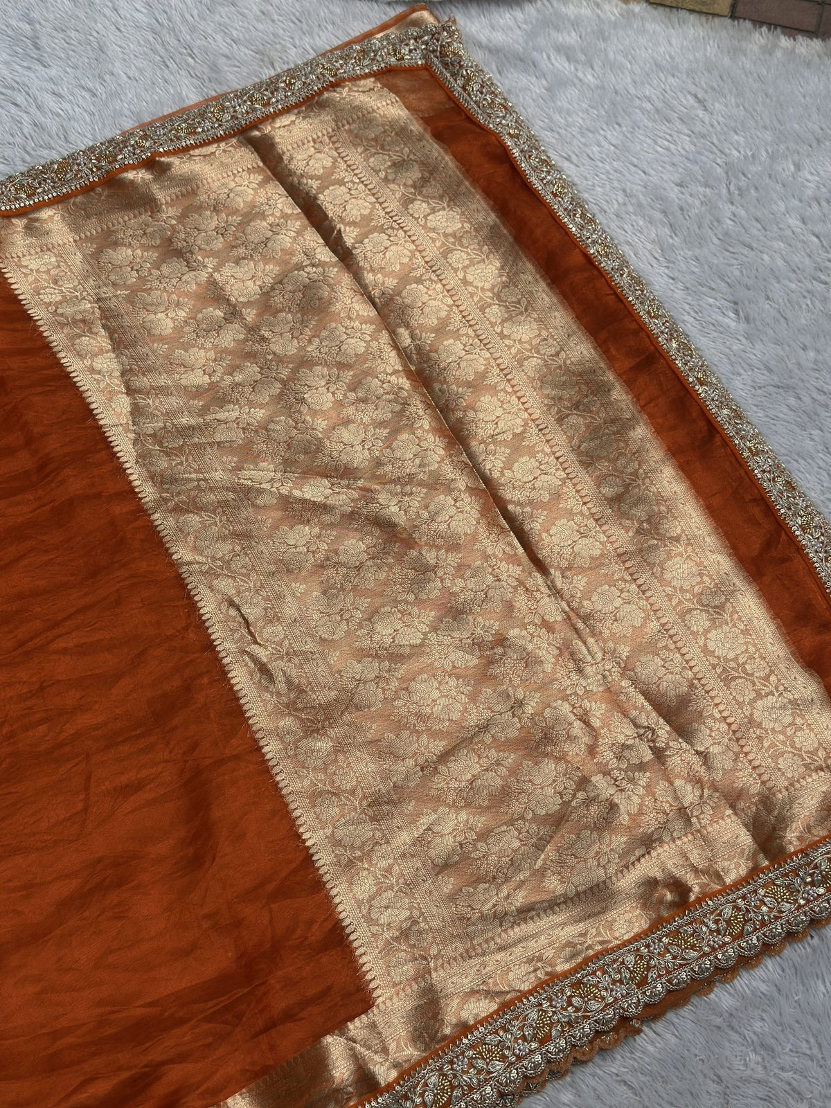 Saundarya orange Banarasi tissue saree with gold zari brocade pallu