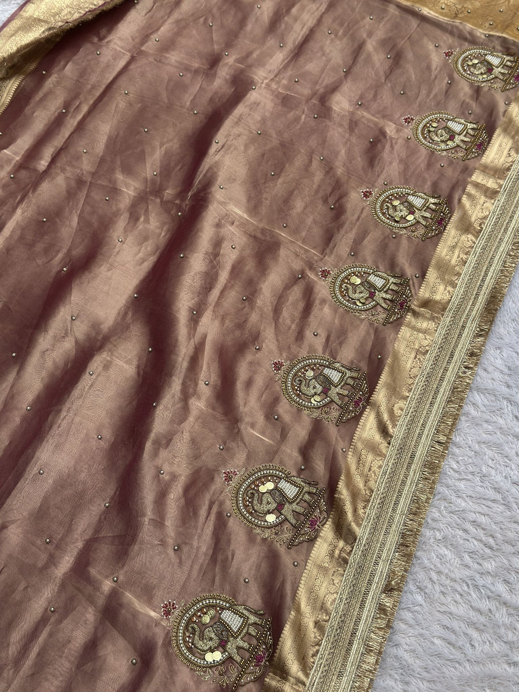 Copper brown tissue saree border with woven elephant (gajraj) motifs