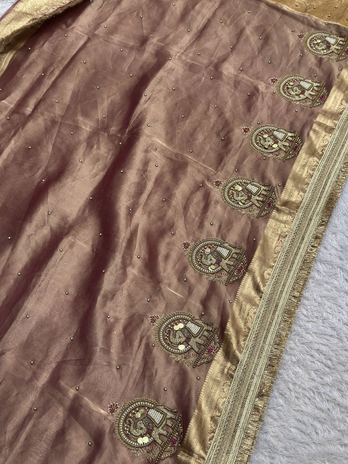 Copper brown tissue saree border with woven elephant (gajraj) motifs