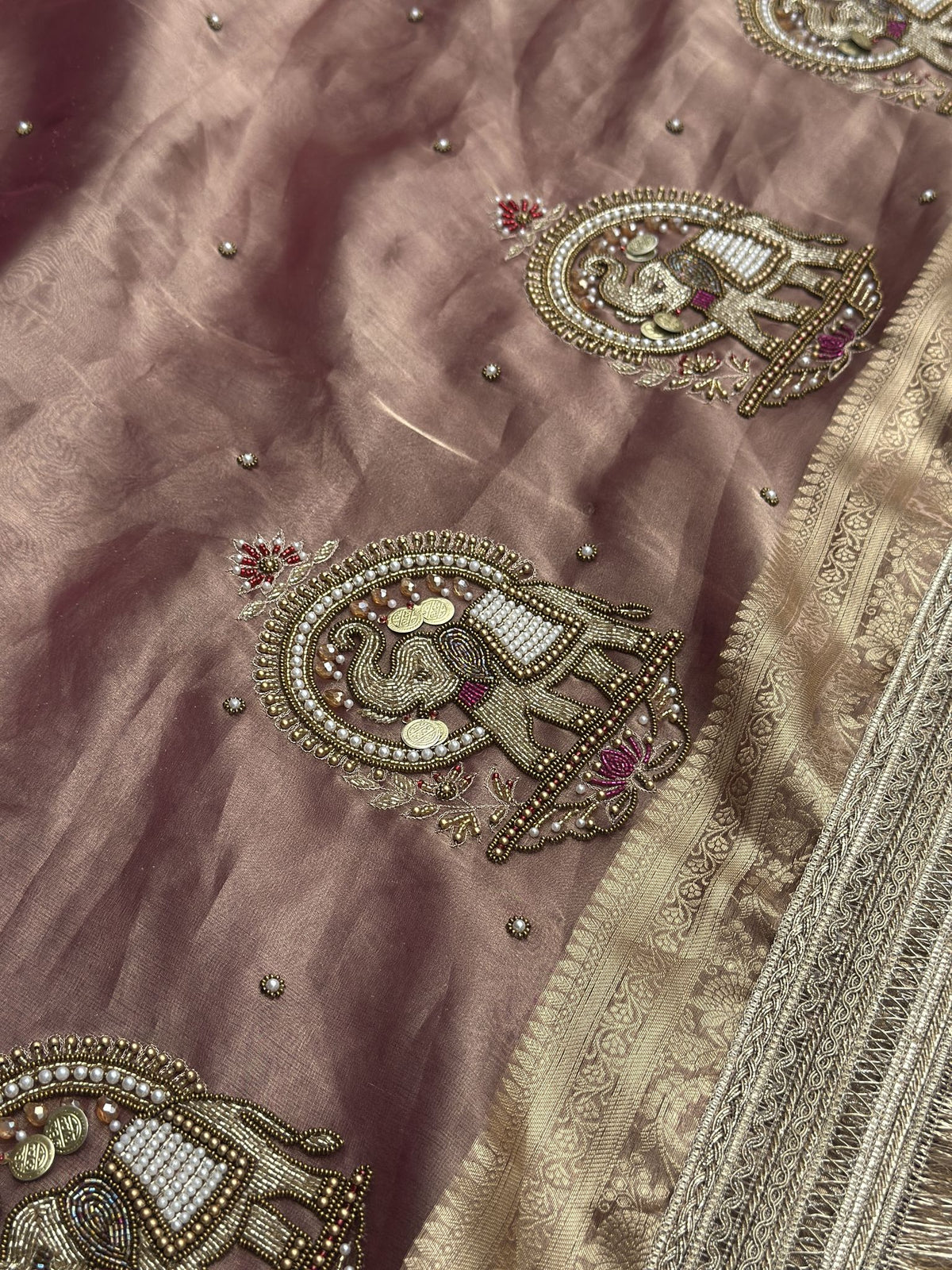 Royal elephant zari weave on copper brown Banarasi tissue saree
