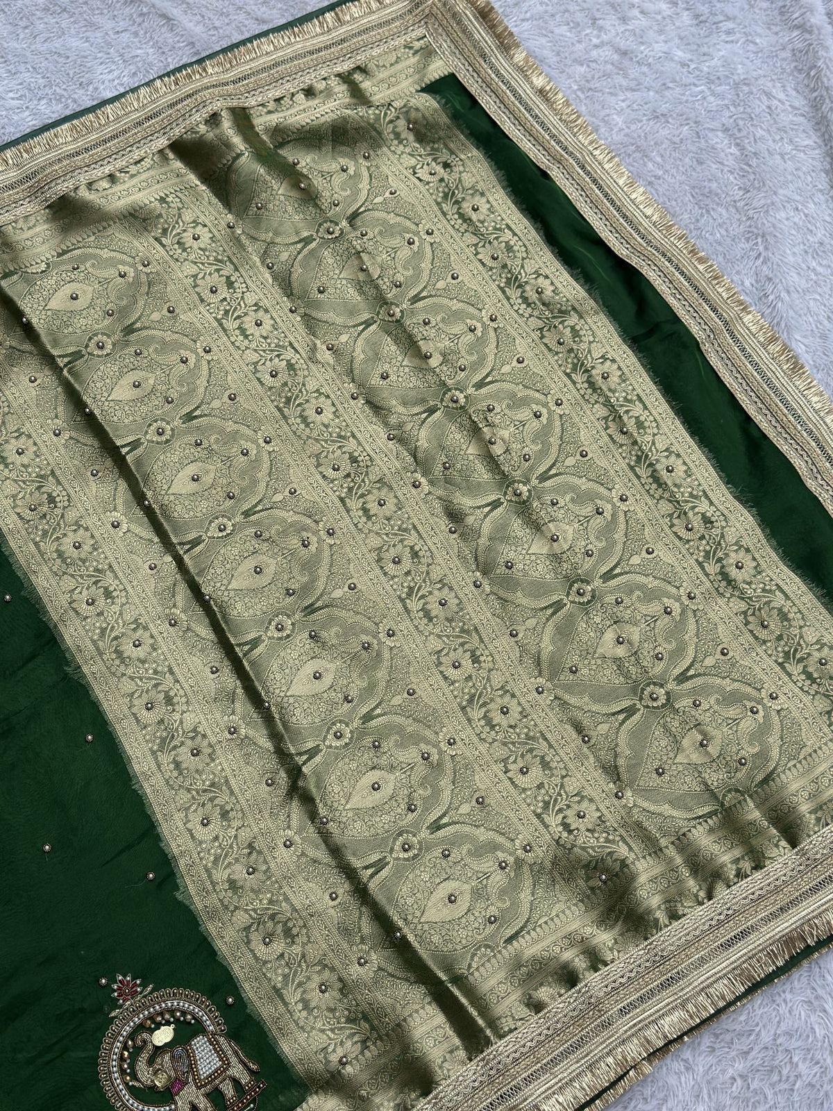 Shahi Gajraj Green Banarasi tissue saree with gold elephant motifs