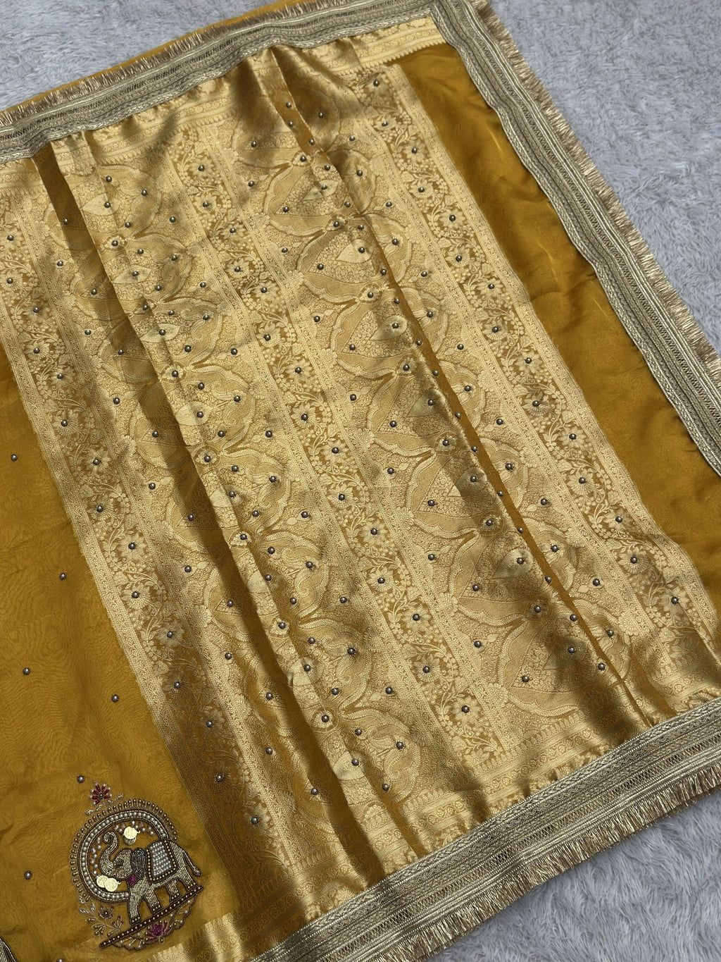 Shahi Gajraj Yellow Banarasi tissue saree with gold elephant motifs