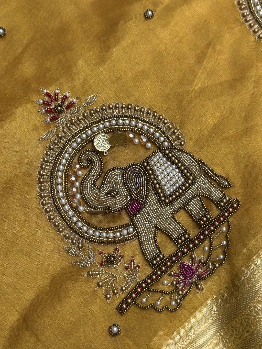 Gold zari elephant motif detail on Shahi Gajraj Yellow saree