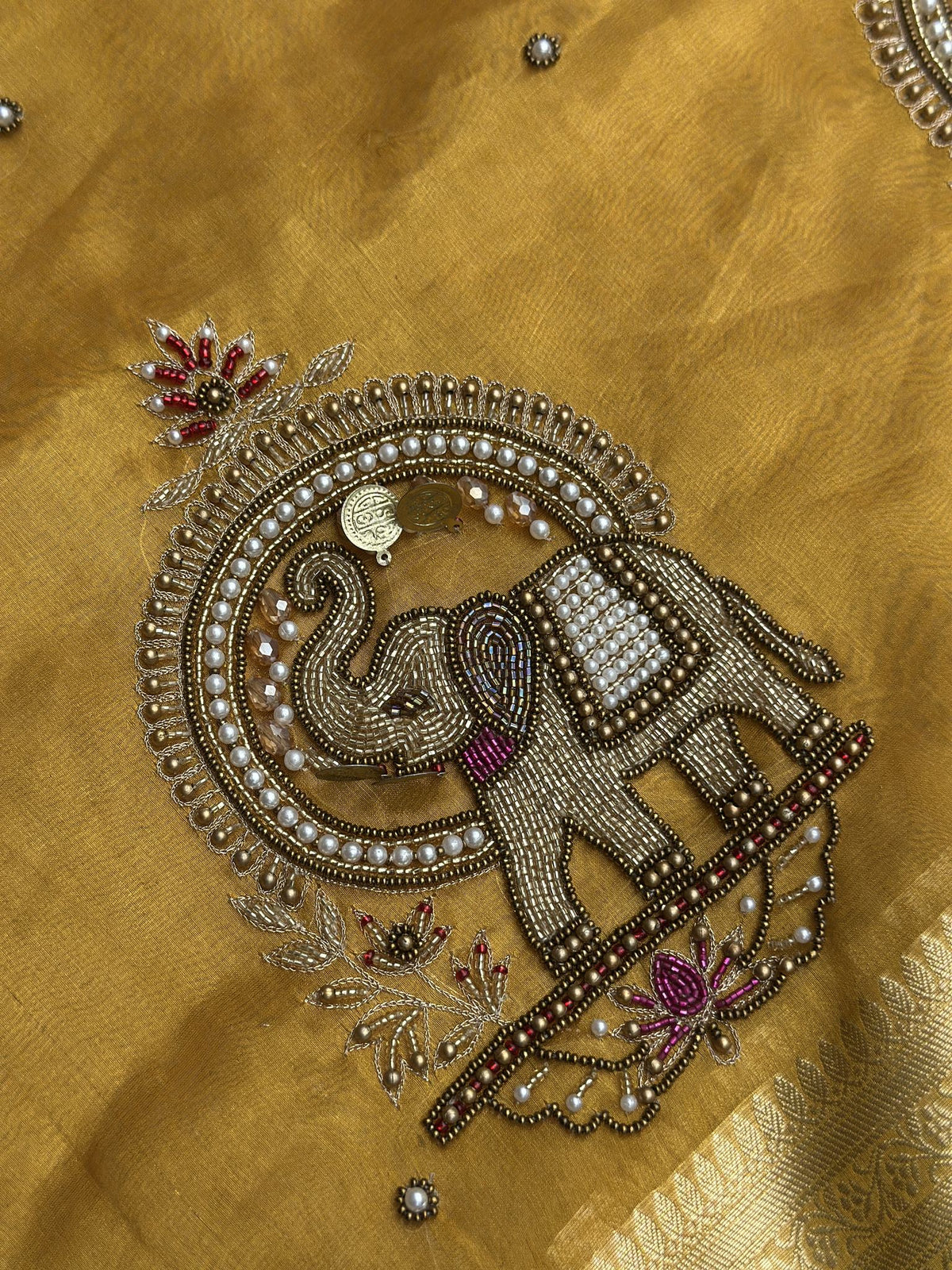 Gold zari elephant motif detail on Shahi Gajraj Yellow saree