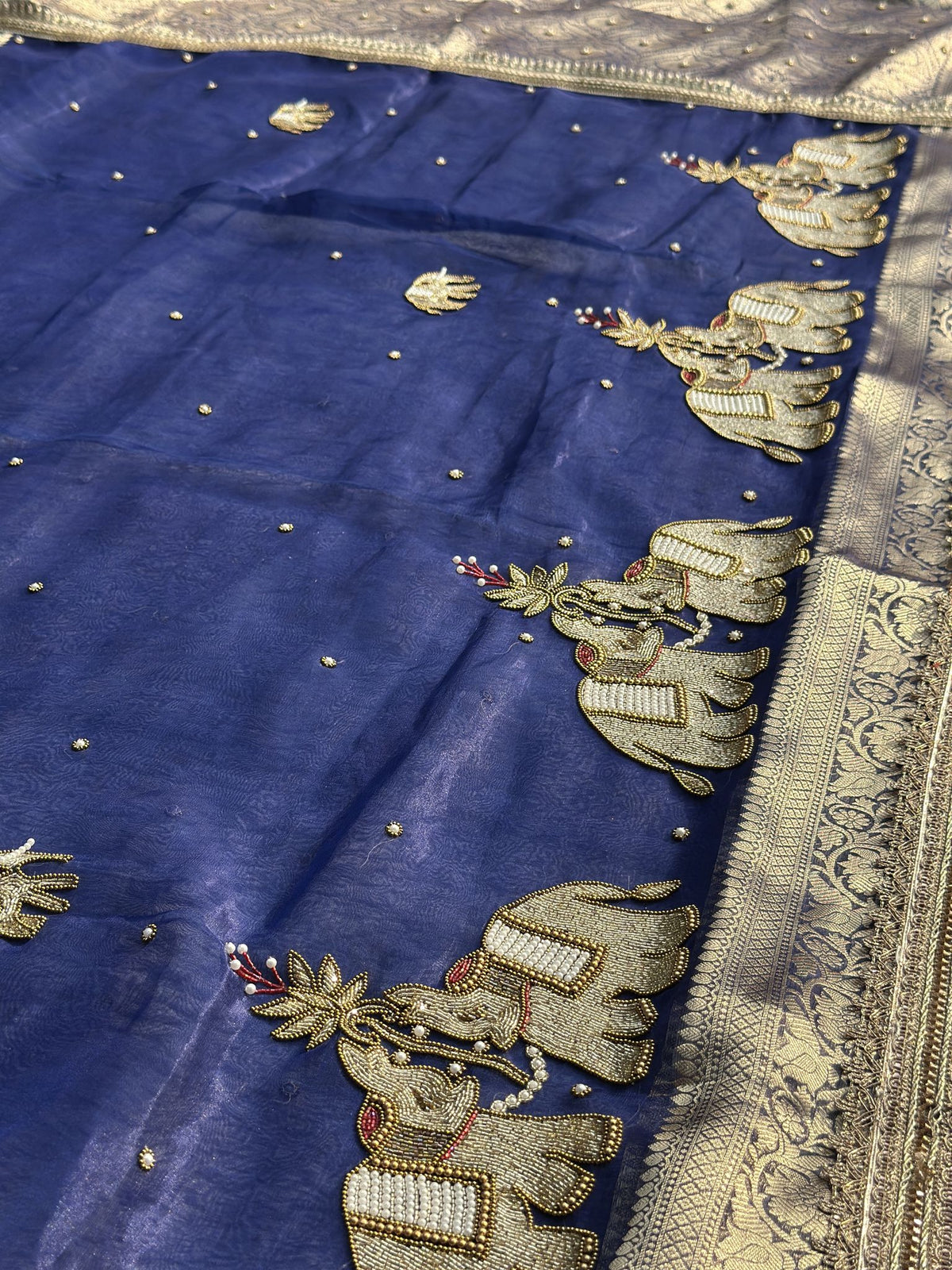 Gold zari Banarasi tissue pallu on Suvarna Hatti Blue saree
